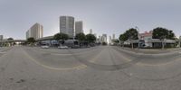 traffic is passing on an empty street in the city of miami, florida, on aug 29, 2009