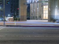 a blurry image of a city street and a traffic light that reads i love hollywood