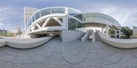 the view of the curved stairs at the foot of a building, from the side