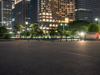 city street with a wide assortment of buildings in the background and cars moving through it