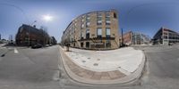 a large building with a building front is shown in this 360 - camera photograph in downtown, minnesota