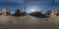 two distorted pictures show a city street with traffic and people walking around the intersection of the intersection