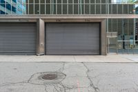 a metal garage door is left on the sidewalk by a fire hydrant and a stop sign