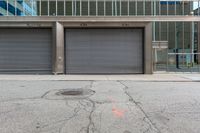 a metal garage door is left on the sidewalk by a fire hydrant and a stop sign