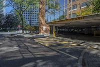 a car is in a parking lot with tall buildings near the curb in a city