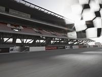 a photo taken from a distance, driving a race car on a track with an in turn checkered