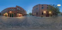 three different angles of a brick street at dusk with buildings and street lights reflecting in the street