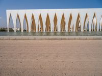 Egyptian Urban Road: Profiled Buildings Under a Clear Sky