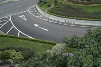 the road is narrow, but the markings are well marked in a shape of a curve