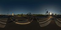 the 360 - vision image shows what appears to be an empty lot with ramps and pedestrian lights on the ground