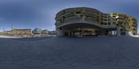 a fish eye image of some building and sky background with blue sky in the foreground