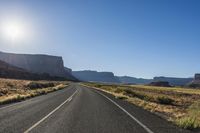 Empty Asphalt Road through Highlands with Sunlit Mountains HDRi Maps ...