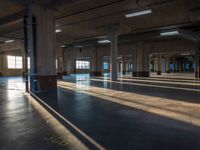 an empty building with several windows and no people on the ground or outside it,