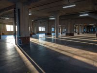 an empty building with several windows and no people on the ground or outside it,