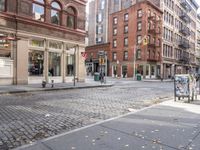 this is an image of a city corner, which looks to be empty and has trash bags scattered on the street
