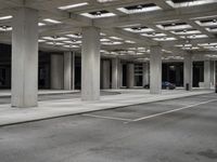 empty city street in concrete building structure with white ceiling tiles on roof area and people walking