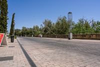 the empty city street is clean and has signs on it advertising people to choose the right