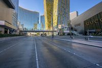 this picture shows an empty city street at sunset with many circles in the middle of the road