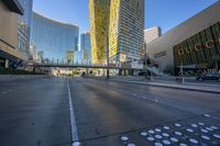 this picture shows an empty city street at sunset with many circles in the middle of the road