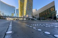 this picture shows an empty city street at sunset with many circles in the middle of the road