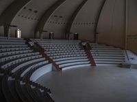 a view of an empty concert auditorium, with the stairs up and the roof down