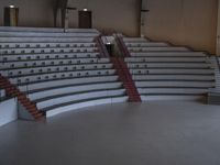 a view of an empty concert auditorium, with the stairs up and the roof down