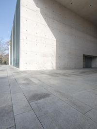 an empty concrete walkway between buildings and trees royalty photos, images and stock illustrations public land architecture, building facade, empty, concrete walkway, architecture art, art, white walls, modern homes, sidewalk, landscape