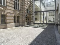 the empty courtyard in an old european building is seen from the front angle up view