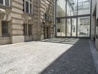 the empty courtyard in an old european building is seen from the front angle up view