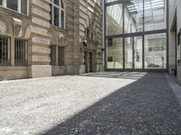 the empty courtyard in an old european building is seen from the front angle up view