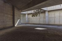 the interior of a concrete building is empty and empty and there are no lighting in the room