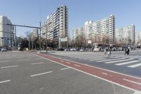 the intersection at a busy city street is empty of cars and pedestrians to cross the street