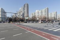 the intersection at a busy city street is empty of cars and pedestrians to cross the street
