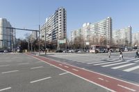 the intersection at a busy city street is empty of cars and pedestrians to cross the street