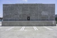 there is an empty parking lot with no one in it as shown, and is gray