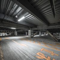 an empty parking garage with a sign saying,'park it all'in the middle