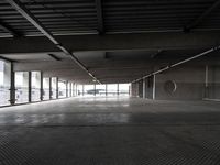 an empty parking garage has been transformed into a tunnel for pedestrians to use as a car park