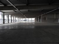 an empty parking garage has been transformed into a tunnel for pedestrians to use as a car park