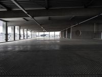 an empty parking garage has been transformed into a tunnel for pedestrians to use as a car park