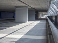 the empty parking garage of an unfinished building, has numbered numbers 3 - 8 on it