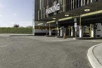 this is an image of parking garages with no cars in them is empty and waiting