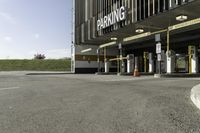 this is an image of parking garages with no cars in them is empty and waiting