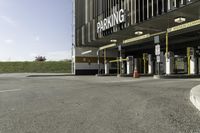 this is an image of parking garages with no cars in them is empty and waiting