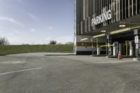 this is an image of parking garages with no cars in them is empty and waiting