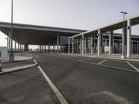 the parking lot at an airport is empty and ready for passengers to use it on