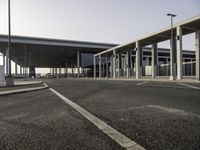 the parking lot at an airport is empty and ready for passengers to use it on