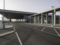 the parking lot at an airport is empty and ready for passengers to use it on