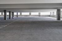 a picture of an empty parking lot in the daytime or the day light is on