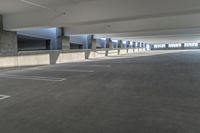 a picture of an empty parking lot in the daytime or the day light is on