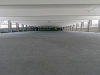 a picture of an empty parking lot in the daytime or the day light is on